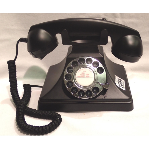 1066 - The GPO 200 rotary telephone has a metal base and handset; traditional cloth handset curly cord & is... 