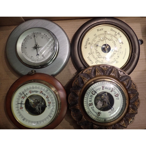 1071 - Four barometers including a carved example with spare glass, largest D: 22 cm. Not available for in-... 