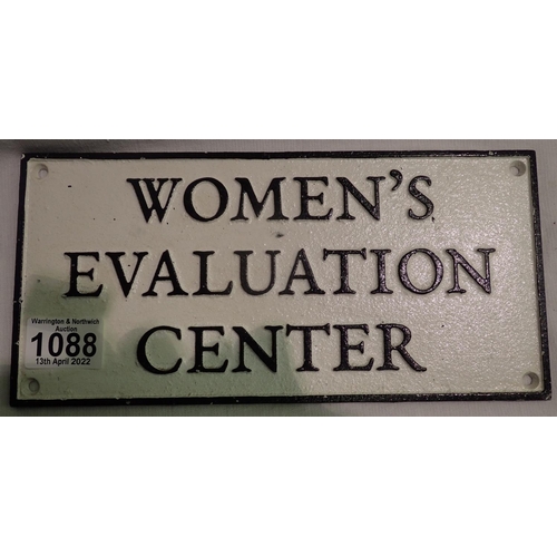 1088 - Cast iron Womens Evaluation Centre sign. P&P Group 2 (£18+VAT for the first lot and £3+VAT for subse... 