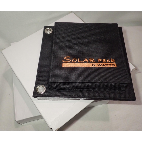 1098 - New old stock, 2 x 6 watt folding solar panel pack to recharge mobile phones and tablets. The solar ... 