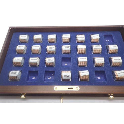 3086 - Danbury Mint collectors chest of 2006 quarters, part complete, having 41/50 state quarters and 41/50... 