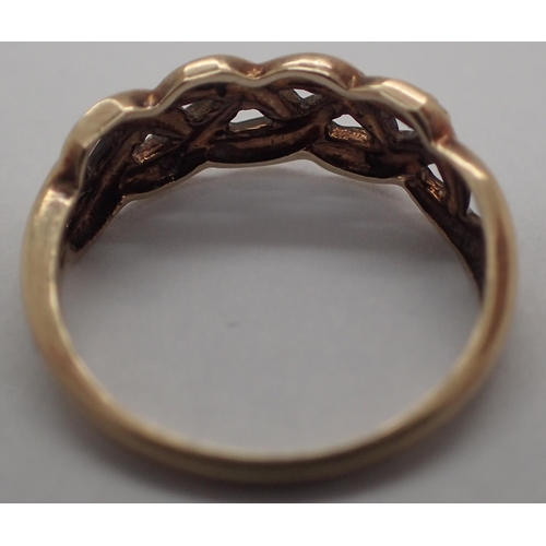 22 - 9ct gold and diamond knot ring, size I, 1.4g. P&P Group 1 (£14+VAT for the first lot and £1+VAT for ... 