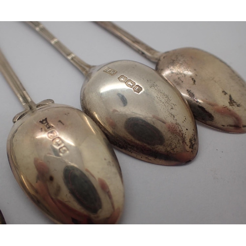 99A - Six hallmarked silver coffee bean spoons and five silver teaspoons, 90g. Not available for in-house ... 