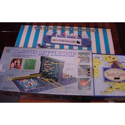 2138 - Three boxed games; Computer Battleships, Fairground Shooting Gallery and Train Game. P&P Group 2 (£1... 