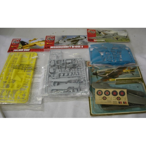 2162 - Four Airfix 1/72 scale kits, Spitfire, Hurricane, Messerschmitt 109 and Folland Gnat (red arrows tra... 