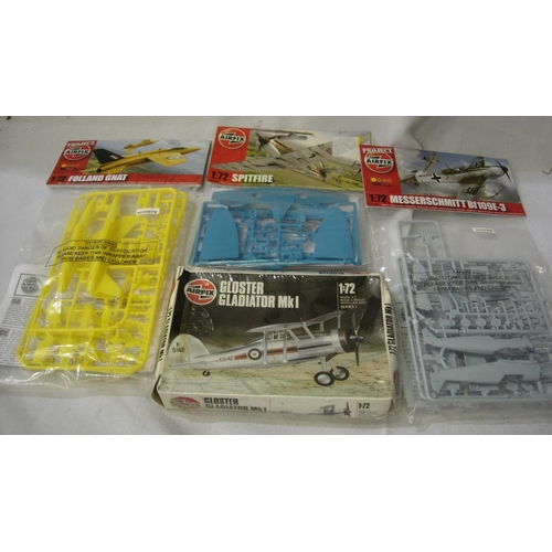 2165 - Four Airfix 1/72 scale aircraft kits, Spitfire, Messerschmitt 109 and Folland Gnat (red arrows train... 