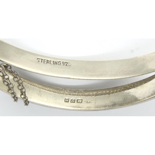 15 - A hallmarked silver bangle and a 925 silver example, 23g (2). P&P Group 1 (£14+VAT for the first lot... 