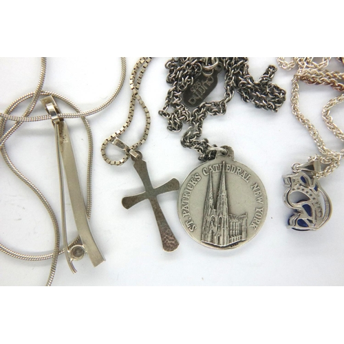 6 - Four 925 silver neck chains and pendants to include a cross. P&P Group 1 (£14+VAT for the first lot ... 