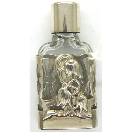 101 - Perfume bottle with hallmarked silver collar and sleeve, London assay. P&P Group 1 (£14+VAT for the ... 