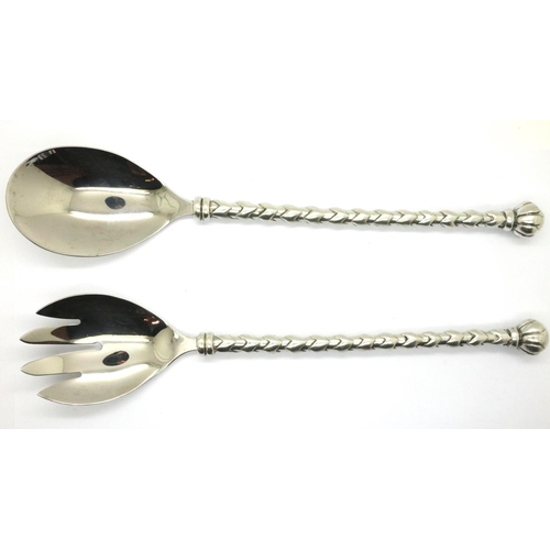 105 - Carrol Boyes (South African); pair of aluminium and steel salad servers, each L: 28 cm, dated 2001. ... 