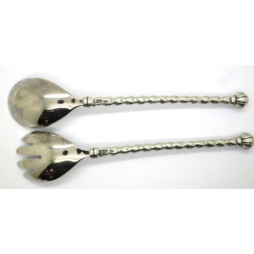 105 - Carrol Boyes (South African); pair of aluminium and steel salad servers, each L: 28 cm, dated 2001. ... 