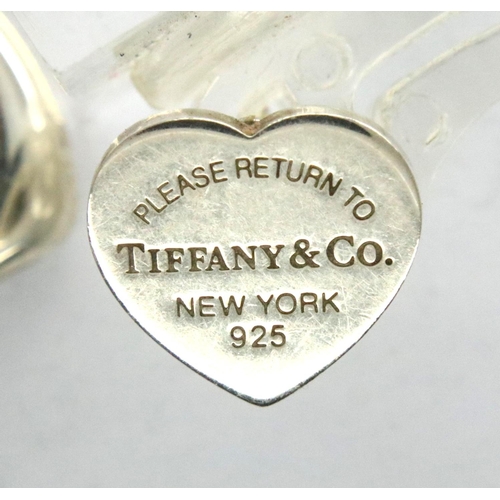 57 - Tiffany & Co fine silver neck chain and heart pendant set with a single diamond and a single earring... 