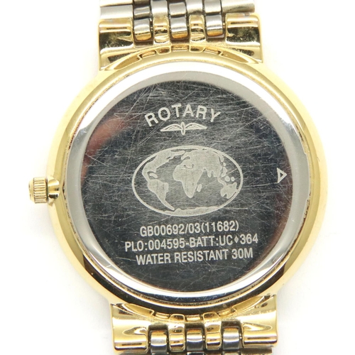 73 - Rotary; quartz day date gold plated wristwatch in a wooden case, requires battery. P&P Group 1 (£14+... 