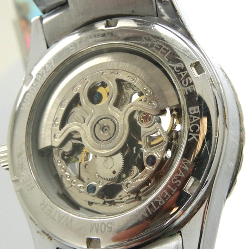 74 - Master Time; gents automatic skeleton wristwatch on stainless steel bracelet, working at lotting. P&... 