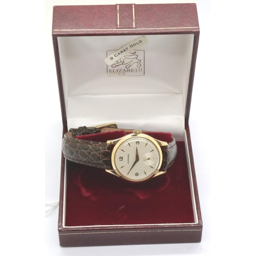 75 - Garrard; 9ct gold gents dress wristwatch with champagne dial and subsidiary seconds dial on leather ... 