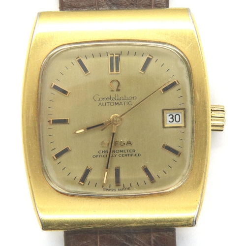 81 - Omega; gents Constellation Chronometer wristwatch with square gold face, date aperture on brown leat... 