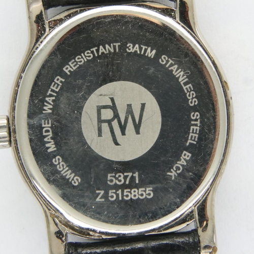 82 - Raymond Weil; ladies steel cased wristwatch with date aperture on a black leather strap, requires ba... 