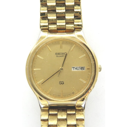 84 - Seiko; gold plated gents wristwatch on a GP bracelet, requires battery. P&P Group 1 (£14+VAT for the... 