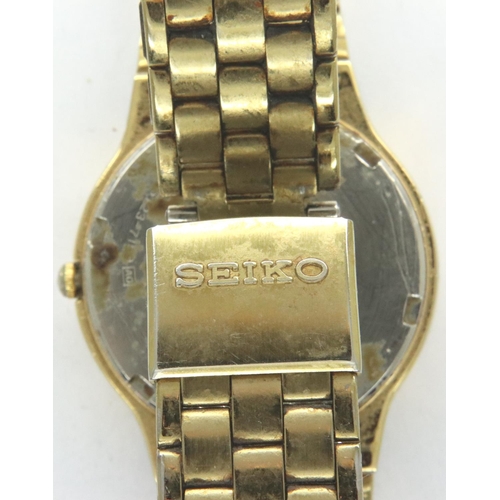 84 - Seiko; gold plated gents wristwatch on a GP bracelet, requires battery. P&P Group 1 (£14+VAT for the... 