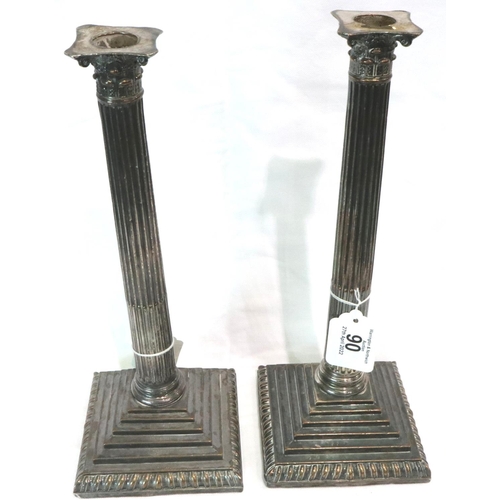 90 - Pair of Corinthian column silver plated candlesticks, each H: 34 cm. P&P Group 2 (£18+VAT for the fi... 