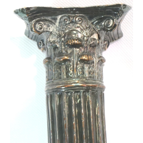 90 - Pair of Corinthian column silver plated candlesticks, each H: 34 cm. P&P Group 2 (£18+VAT for the fi... 