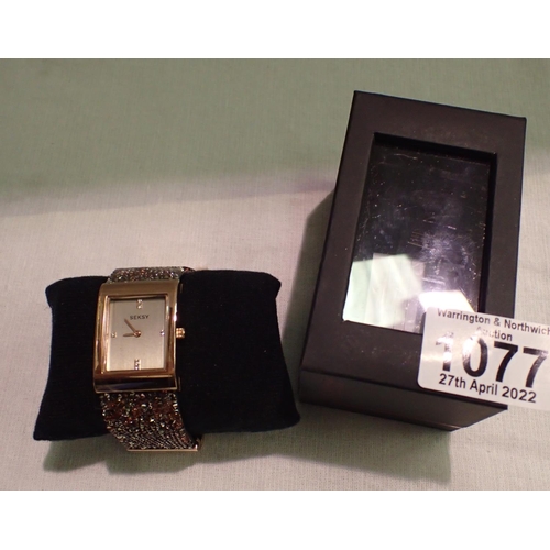 1077 - Boxed ladies Seksy wristwatch with Swarovski crystal bracelet. P&P Group 1 (£14+VAT for the first lo... 