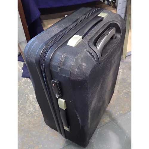 1235 - New and unused wheeled black suitcase with wheels. Not available for in-house P&P, contact Paul O'He... 