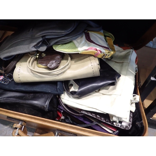 1339 - Suitcase containing mixed fashion bags. Not available for in-house P&P, contact Paul O'Hea at Mailbo... 