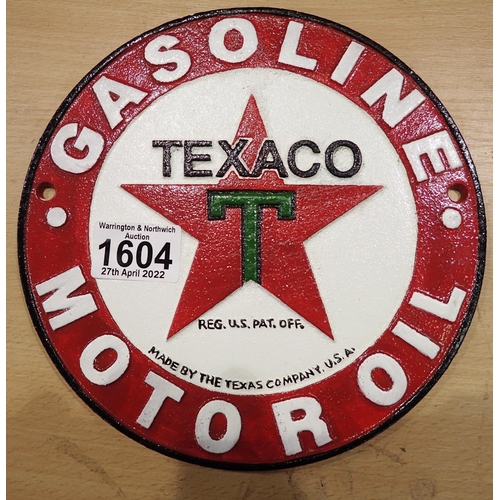 1604 - Cast iron Texaco wall plaque, D: 20 cm. P&P Group 2 (£18+VAT for the first lot and £3+VAT for subseq... 