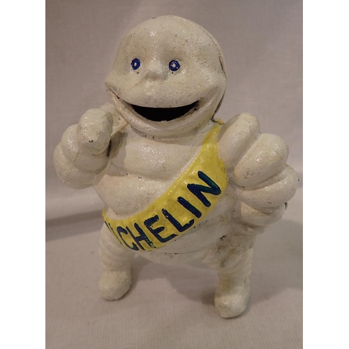 1616 - Cast iron Michelin Man small money box, H: 16 cm. P&P Group 2 (£18+VAT for the first lot and £3+VAT ... 