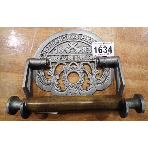 1634 - Cast iron St Pancras toilet roll holder, 20 x 14 cm. P&P Group 2 (£18+VAT for the first lot and £3+V... 