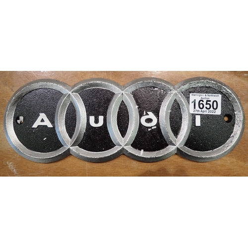 1650 - Cast iron Audi plaque. P&P Group 2 (£18+VAT for the first lot and £3+VAT for subsequent lots)