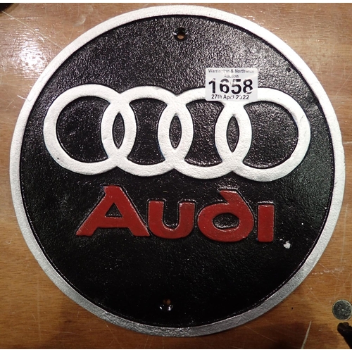 1658 - Cast iron circular Audi plaque, D: 18 cm. P&P Group 2 (£18+VAT for the first lot and £3+VAT for subs... 