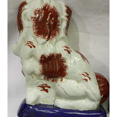 129 - Pair of Staffordshire dogs, each H: 22 cm. P&P Group 3 (£25+VAT for the first lot and £5+VAT for sub... 