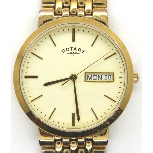 73 - Rotary; quartz day date gold plated wristwatch in a wooden case, requires battery. P&P Group 1 (£14+... 