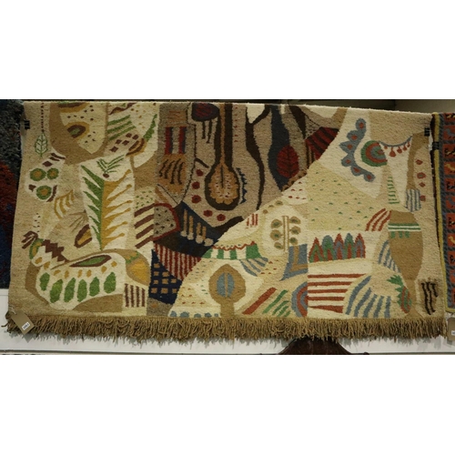 3063 - A South American woven rope rug or wall hanging, Chief Moko? and his Wives, 290 x 200 cm. Not availa... 