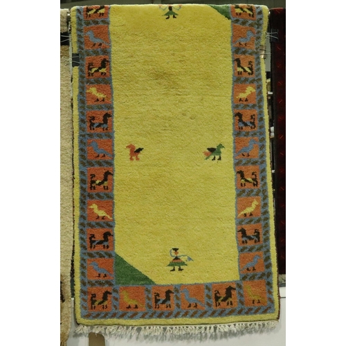 3064 - Yellow ground woollen rug, fringed, 140 x 75 cm. Not available for in-house P&P, contact Paul O'Hea ... 