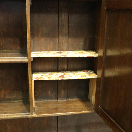 3082 - Early 20th century oak dresser, the slim plate rack with cupboard above sideboard base, 45 x 122 x 2... 