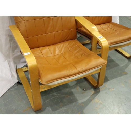 3085 - A pair of modern Scandinavian style lounge chairs with bentwood frames and tan faux leather upholste... 