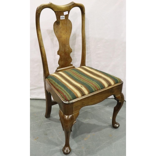 3088 - An early 19th century walnut chair with woolwork upholstered drop-in seat. Not available for in-hous... 