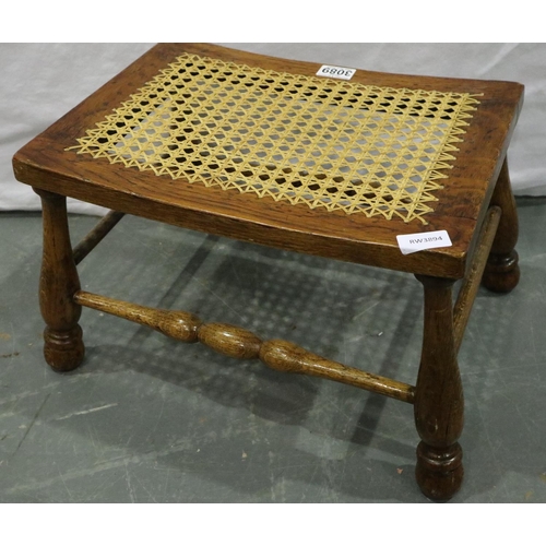 3089 - A 19th century elm framed stool with turned supports and stretchers, and a later canework top. Not a... 