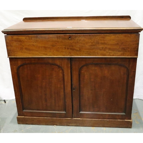 3092 - A Victorian mahogany secretaire, the fitted drawer with hinged writing surface above a two door cupb... 