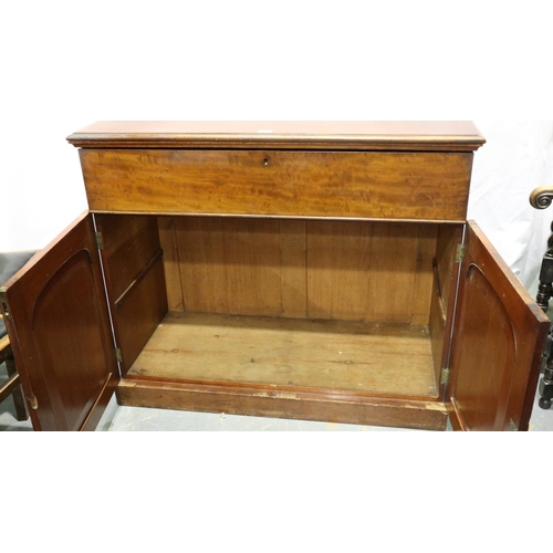 3092 - A Victorian mahogany secretaire, the fitted drawer with hinged writing surface above a two door cupb... 