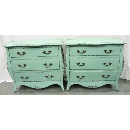 3093 - A pair of contemporary distressed bombe form three-drawer chests, each 78 x 34 x 70 cm H. Not availa... 