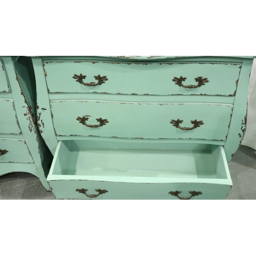 3093 - A pair of contemporary distressed bombe form three-drawer chests, each 78 x 34 x 70 cm H. Not availa... 