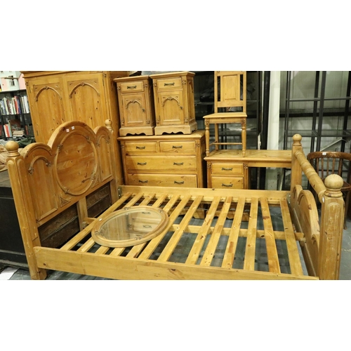 3107 - A contemporary suite of carved pine bedroom furniture comprising wardrobe, chest of five drawers, dr... 