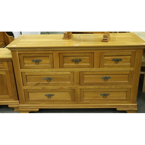 3110 - Frank Hudson bedroom chest of three short above four long drawers in oak, 140 x 53 x 85 cm H, with a... 