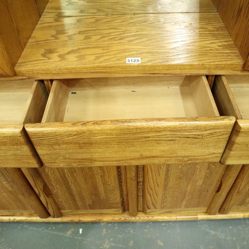 3125 - Substantial oak sideboard with four cupboards, having a three-drawer top-section with display shelve... 