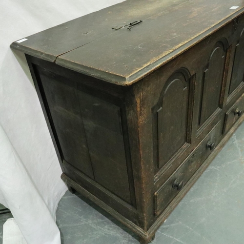 3130 - An 18th century oak mule chest with two long drawers and panelled body, 146 x 59 x 90 cm H. Not avai... 