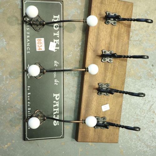 1239A - Two wooden coat racks. Not available for in-house P&P, contact Paul O'Hea at Mailboxes on 01925 6591... 